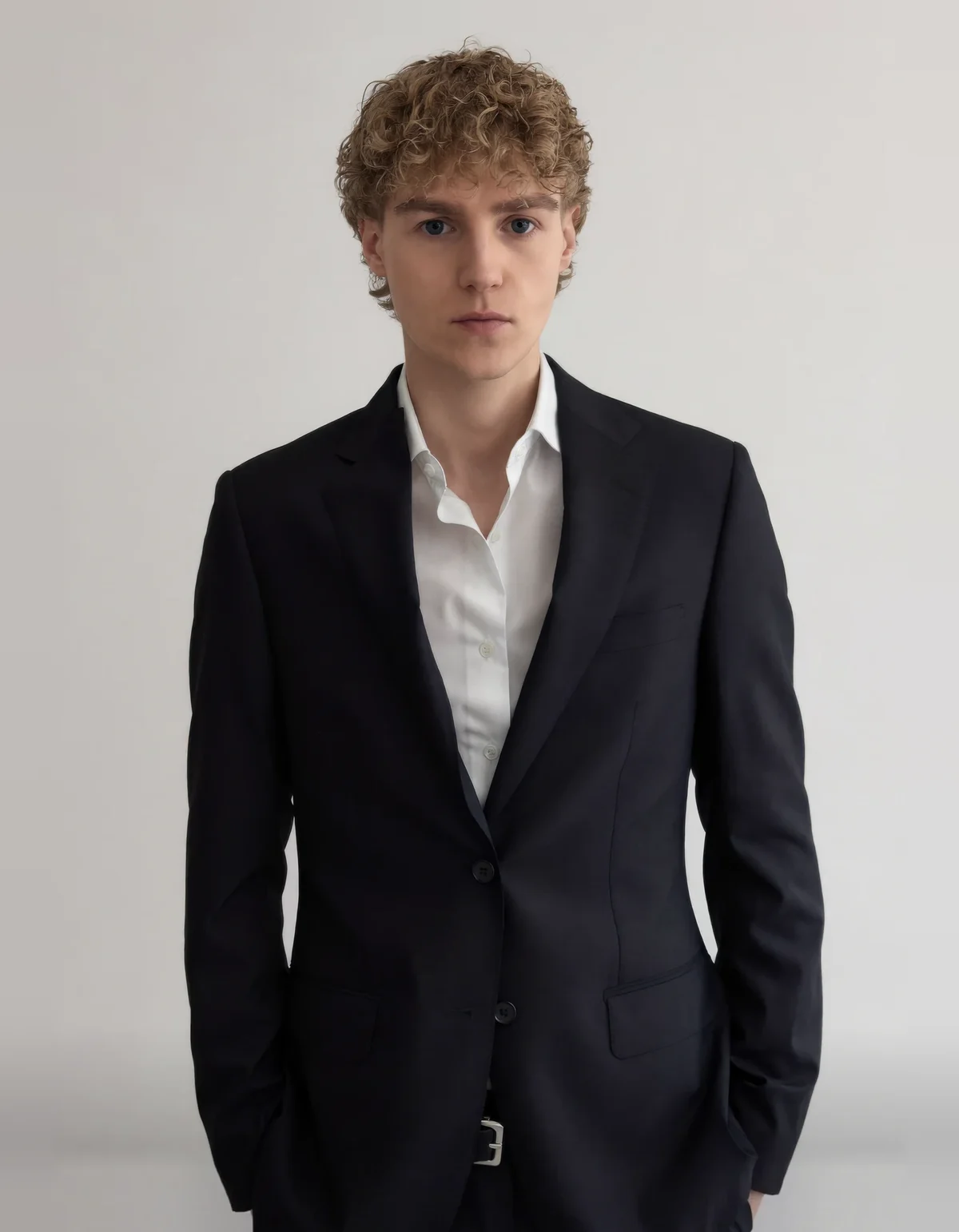 Jan Sander in a dark suit